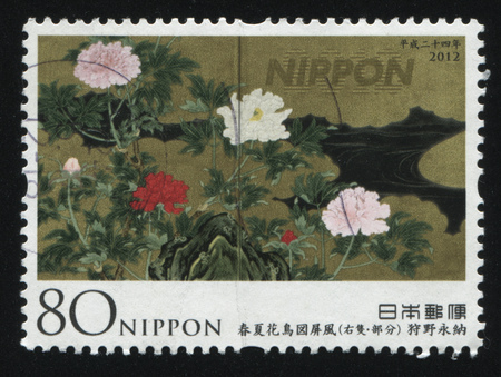 RUSSIA KALININGRAD, 18 MARCH 2016: stamp printed by Japan, shows flowers growing near brook, circa 2012のeditorial素材