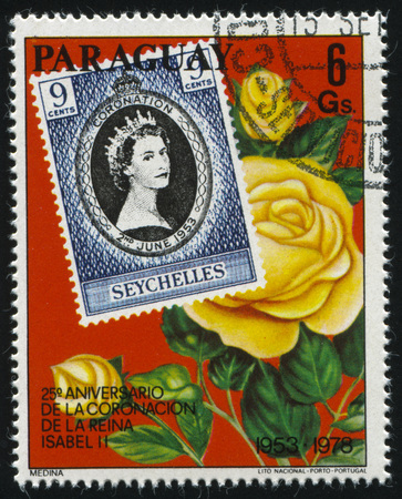RUSSIA KALININGRAD, 22 APRIL 2017: stamp printed by Paraguay, shows flower and Queen Elizabeth II, circa 1978のeditorial素材