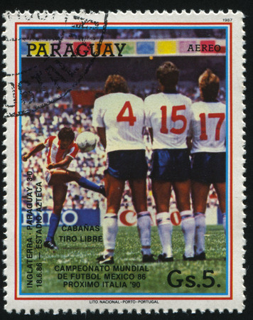 RUSSIA KALININGRAD, 19 APRIL 2017: stamp printed by Paraguay, shows football, circa 1987のeditorial素材