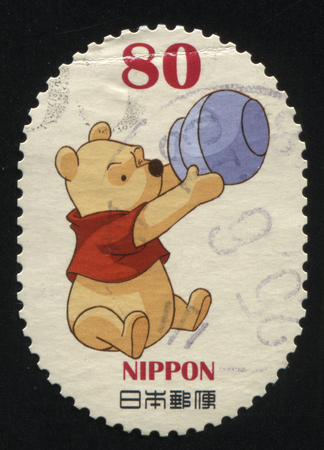 RUSSIA KALININGRAD, 22 APRIL 2016: stamp printed by Japan shows Winnie-the-Pooh, circa 2012のeditorial素材
