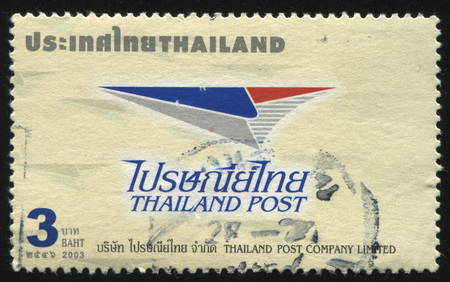 RUSSIA KALININGRAD, 2 JUNE 2016: stamp printed by Thailand, shows logo of Thailand Post Company Limited, 2003のeditorial素材