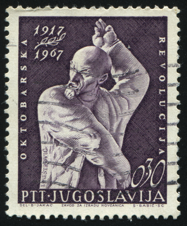 RUSSIA KALININGRAD, 12 NOVEMBER 2016: stamp printed by Yugoslavia, shows the monument to Lenin by Mestovic, circa 1967のeditorial素材