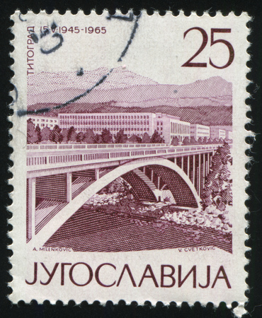 RUSSIA KALININGRAD, 12 NOVEMBER 2016: stamp printed by Yugoslavia, shows the city of Titograd, circa 1965のeditorial素材