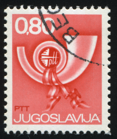 RUSSIA KALININGRAD, 12 NOVEMBER 2016: stamp printed by Yugoslavia, shows post horn, circa 1974のeditorial素材
