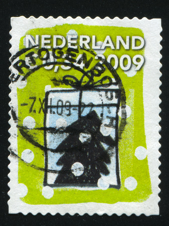 RUSSIA KALININGRAD, 4 JULY 2017: stamp printed by Netherlands shows merry christmas holiday, circa 2009のeditorial素材