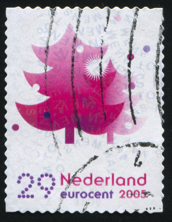 RUSSIA KALININGRAD, 4 JULY 2017: stamp printed by Netherlands shows merry christmas holiday, circa 2005のeditorial素材