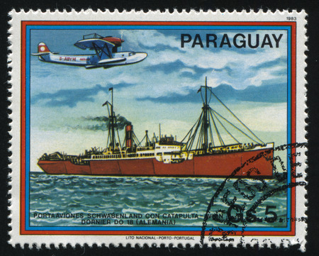 RUSSIA KALININGRAD, 22 APRIL 2017: stamp printed by Paraguay, shows Schwabenland Dornier DO-18 from Germany, circa 1983のeditorial素材