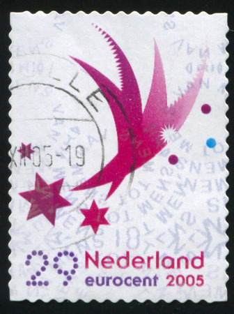 RUSSIA KALININGRAD, 4 JULY 2017: stamp printed by Netherlands shows merry christmas holiday, circa 2005のeditorial素材
