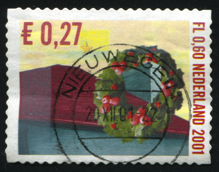 RUSSIA KALININGRAD, 4 JULY 2017: stamp printed by Netherlands shows merry christmas holiday, circa 2001のeditorial素材
