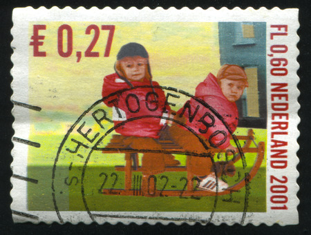 RUSSIA KALININGRAD, 4 JULY 2017: stamp printed by Netherlands shows merry christmas holiday, circa 2001のeditorial素材
