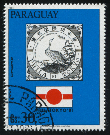 RUSSIA KALININGRAD, 19 APRIL 2017: stamp printed by Paraguay, shows the emblem of the International Stamp Exhibition in Tokio, circa 1981のeditorial素材