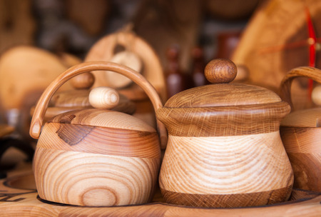Handcrafted wooden dishes. Village Market. Sale of dishes.の写真素材