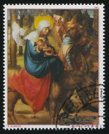 RUSSIA KALININGRAD, 19 APRIL 2017: stamp printed by Paraguay, shows Painting flight to Egypt by Albrecht Durer, circa 1982のeditorial素材