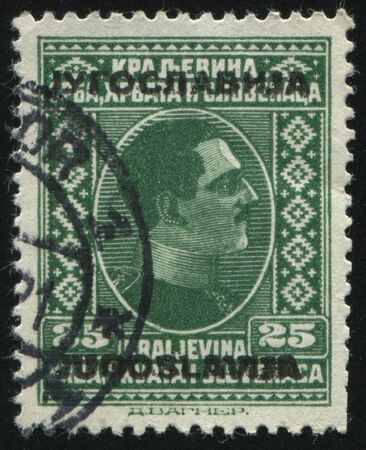 RUSSIA KALININGRAD,12 NOVEMBER 2016: stamp printed by Yugoslavia, shows the portrait of King Alexander, circa 1926のeditorial素材