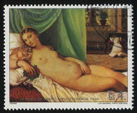 RUSSIA KALININGRAD, 19 APRIL 2017: stamp printed by Paraguay, shows  Painting Venus of Urbino by Titian, circa 1985のeditorial素材