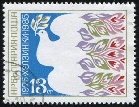 RUSSIA KALININGRAD, 26 MARCH 2019: stamp printed by Bulgaria shows dove, circa 1985のeditorial素材