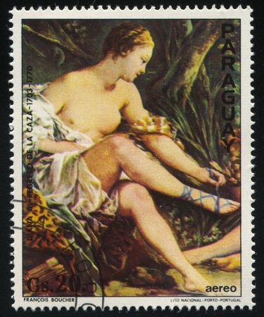 RUSSIA KALININGRAD, 19 APRIL 2017: stamp printed by Paraguay, shows Painting Diana Resting after the Hunt by Francois Boucher, circa 1977のeditorial素材