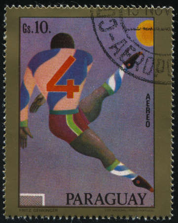 RUSSIA KALININGRAD, 19 APRIL 2017: stamp printed by Paraguay, shows the Soccer player, circa 1977のeditorial素材