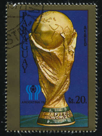 RUSSIA KALININGRAD, 19 APRIL 2017: stamp printed by Paraguay, shows the cup for FIFA world cup competitions, circa 1978のeditorial素材