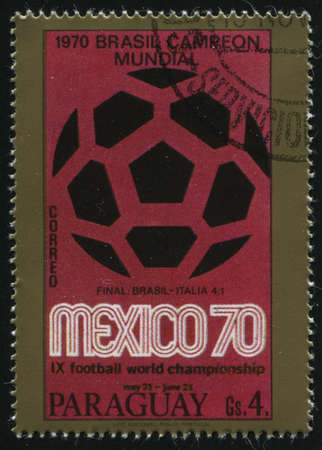 RUSSIA KALININGRAD, 19 APRIL 2017: stamp printed by Paraguay, shows poster devoted to soccer final at world championship in Mexico, circa 1970のeditorial素材