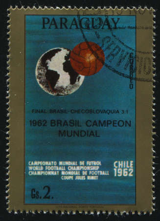 RUSSIA KALININGRAD, 19 APRIL 2017: stamp printed by Paraguay, shows poster devoted to soccer championship, circa 1962のeditorial素材