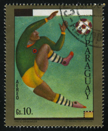 RUSSIA KALININGRAD, 19 APRIL 2017: stamp printed by Paraguay, shows the Soccer player, circa 1977のeditorial素材