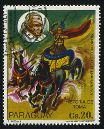 RUSSIA KALININGRAD, 19 APRIL 2017: stamp printed by Paraguay, shows Painting History of Rome and Portrait of Theodor Mommsen by Medina, circa 1977のeditorial素材