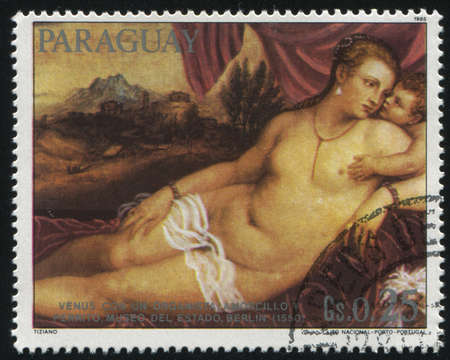 RUSSIA KALININGRAD, 19 APRIL 2017: stamp printed by Paraguay, shows Painting  Venus and Organist by Titian, circa 1985のeditorial素材