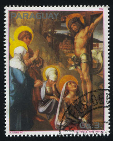 RUSSIA KALININGRAD, 19 APRIL 2017: stamp printed by Paraguay, shows  Painting Christ on the Cross by Albrecht Durer, circa 1982のeditorial素材