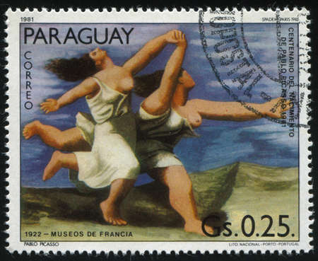 RUSSIA KALININGRAD, 19 APRIL 2017: stamp printed by Paraguay, shows Painting  Woman Running on the Beach by Pablo Picasso, circa 1981のeditorial素材