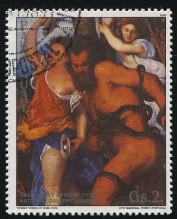 RUSSIA KALININGRAD, 19 APRIL 2017: stamp printed by Paraguay, shows Painting Bacchus and Ariadne by Tiziano, circa 1989のeditorial素材
