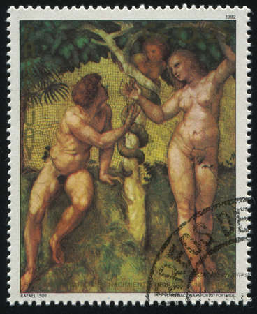RUSSIA KALININGRAD, 19 APRIL 2017: stamp printed by Paraguay, shows Painting Adam and Eve (The Fall) by Raphael, circa 1982のeditorial素材