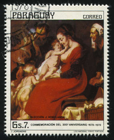 RUSSIA KALININGRAD, 19 APRIL 2017: stamp printed by Paraguay, shows Painting Holy Family by Jordaens, circa 1978のeditorial素材
