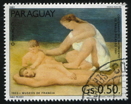 RUSSIA KALININGRAD, 19 APRIL 2017: stamp printed by Paraguay, shows Painting  Family on the Beach by Pablo Picasso, circa 1981のeditorial素材