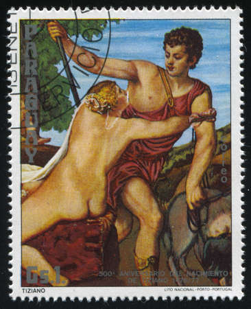RUSSIA KALININGRAD, 19 APRIL 2017: stamp printed by Paraguay, shows Painting Venus and Adonis by Tiziano, circa 1976のeditorial素材