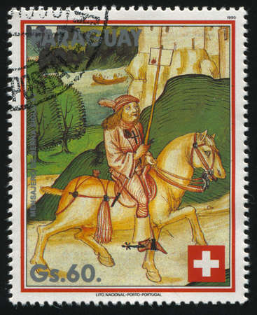 RUSSIA KALININGRAD, 19 APRIL 2017: stamp printed by Paraguay, shows Painting Man Riding a Horse, circa 1990のeditorial素材