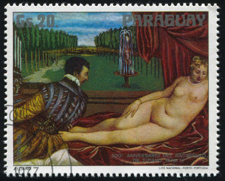 RUSSIA KALININGRAD, 19 APRIL 2017: stamp printed by Paraguay, shows Painting  Venus and Organist by Titian, circa 1976のeditorial素材