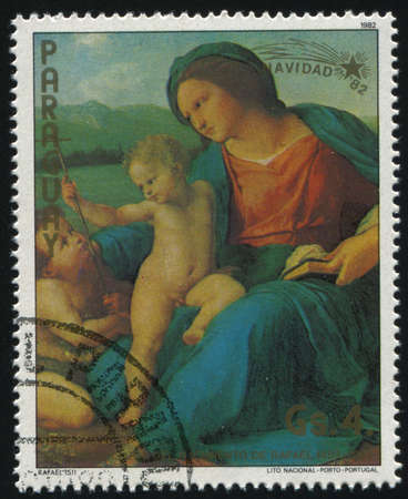 RUSSIA KALININGRAD, 19 APRIL 2017: stamp printed by Paraguay, shows Painting the Alba Madonna by Raphael, circa 1982のeditorial素材