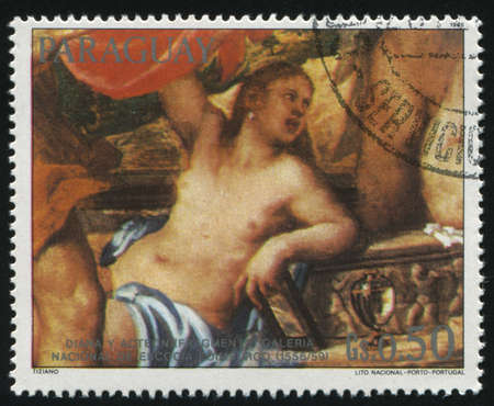RUSSIA KALININGRAD, 19 APRIL 2017: stamp printed by Paraguay, shows Painting  Diana and Actaeon by Titian, circa 1985のeditorial素材