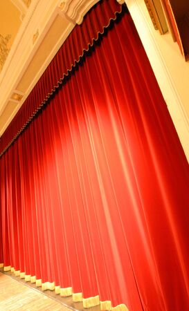 Red curtain closed in last minutes before the performance. の写真素材