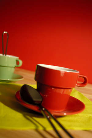 Red cup of coffee with vivid colors.の写真素材