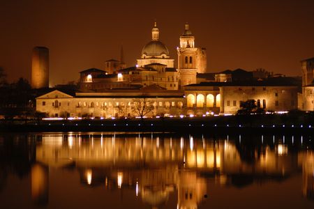 View of italian city of Mantua by night, taken from the lake.の写真素材