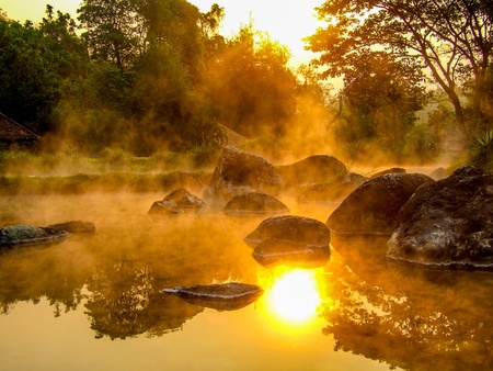 Morning is beautiful goldsteam hot spring with sunlight at Jae Son National Park,Thailandの写真素材