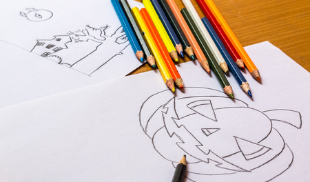 Drawing and coloring prepare a pumpkin for Halloween.の写真素材