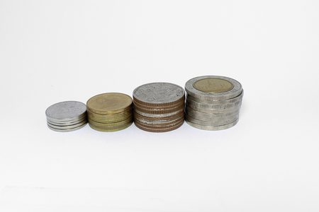 Stack of Thai Bath coins on white backgroundの写真素材