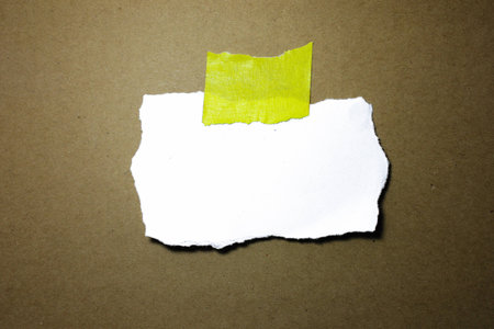 close up of a white note paper on corrugated background with clipping pathの写真素材