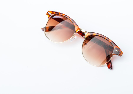 Vintage design turtle frame sunglasses over the white backgroundの写真素材