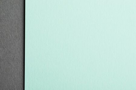 Mint color paper sheet on grey backgroundの写真素材