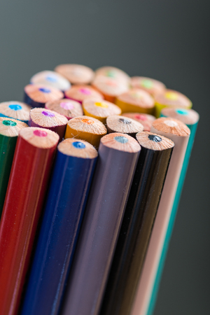 Bunch of color pencils in a standの写真素材