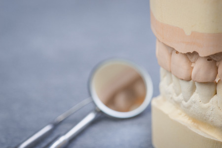 Teeth mold with basic dental tools